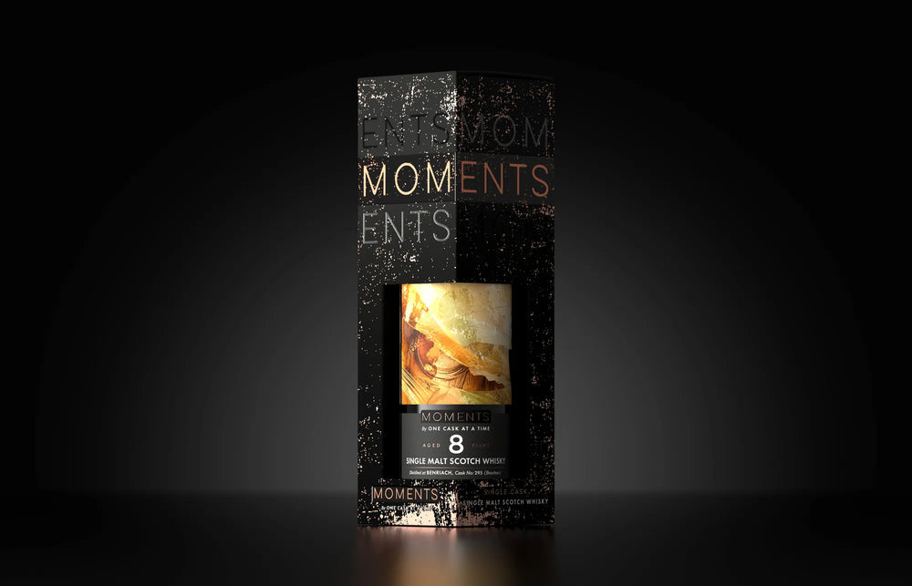 The Golden Drift in its gift carton, on a dark ground