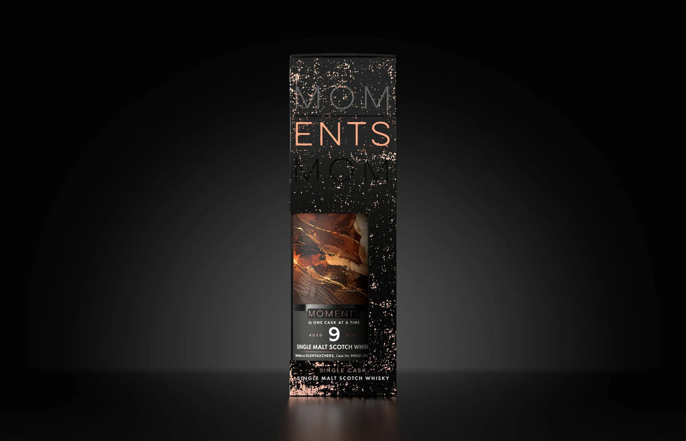 The Dark Zest in its gift carton, on a dark ground