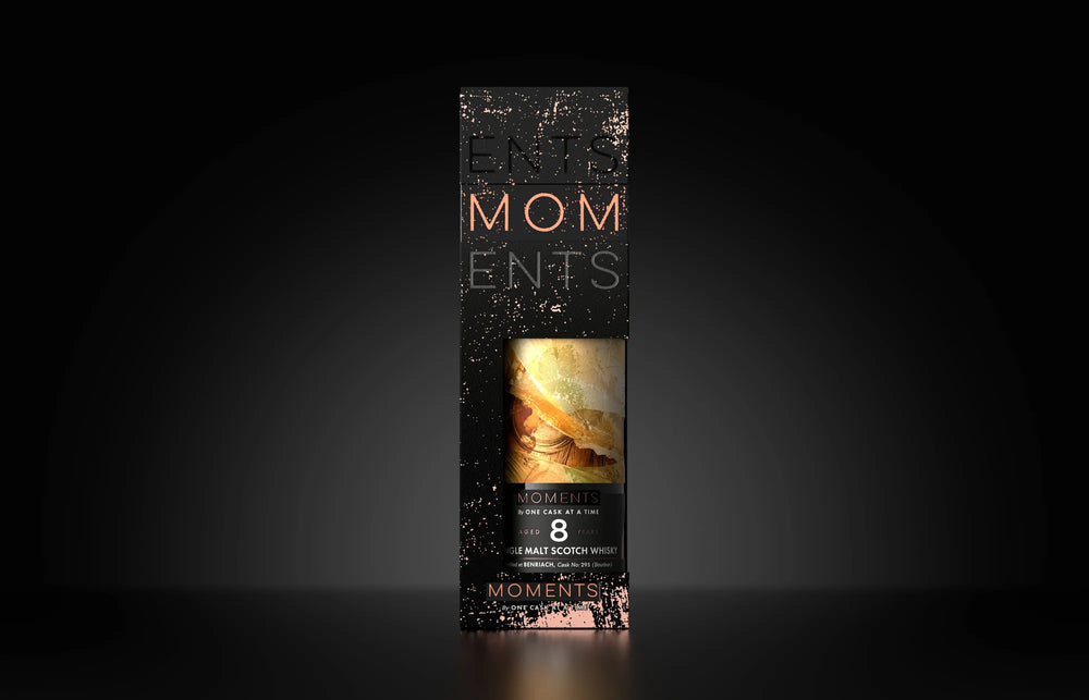 The Golden Drift in its gift carton, on a dark ground