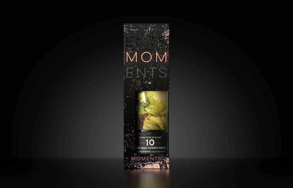 Orchard Glow in its gift carton, on a dark ground