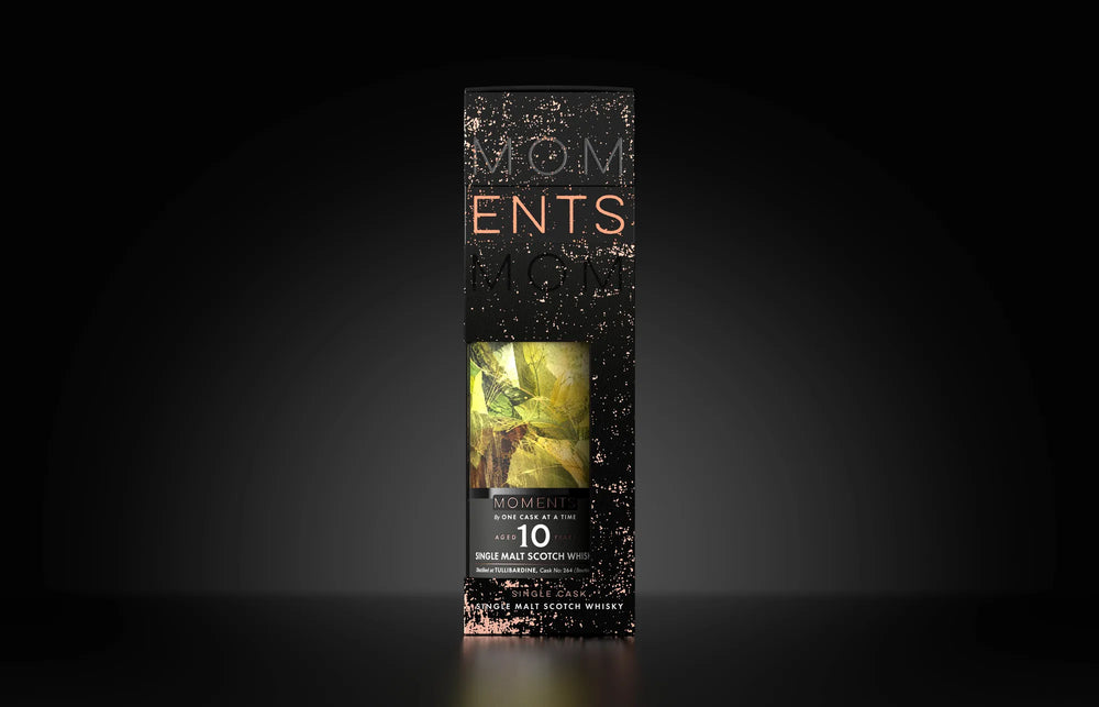 Orchard Glow in its gift carton, on a dark ground
